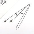 Black metal glasses chain featuring golden-edged cross pendants and rubber loops - Black Gold Large Cross
