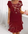 Short sleeve chiffon dress in dark red featuring multi-layer skirt and abstract prints - Geometric Wine Red / S