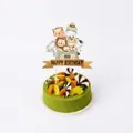 Close-up of jungle animal cake topper with Happy Birthday banner for kids party - Large Cake Topper