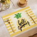 Detailed close-up of a linen placemat with hello summer text and pineapple print - Hello Summer Pineapple