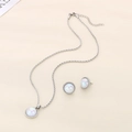 Macro detail of silver necklace and earrings set with white opal gemstones and bead borders - Steel Color 2-Piece Necklace Earrings Set (KS223085-GC) / Steel