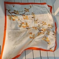 Elegant ivory square silk scarf with orange floral prints and bright orange border - Orange-edged Yellow Floral Square Scarf / 65