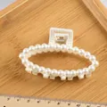 Elegant large pearl claw clip in white acrylic with 8cm oval shark hair clamp design - Hollow Oval