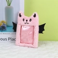 Pink plush photo card holder with bat wings and transparent window for idol cards - Pink