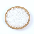 Realistic white translucent PVC grain models displayed on a round wooden tray - Rice Beads (500g)