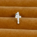 Detailed macro view of a silver cross earring set with white zircons and ball screw back - Silver (Vertical Cross Style Y20412-13)