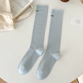 Light blue mid-calf socks with min letter embroidery in a minimalist Japanese style - One Size / Creamy Blue