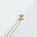 Exaggerated gold necklace featuring a letter Z pendant encrusted with sparkling zircons - Letter Z