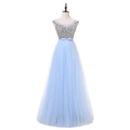 Close-up of the light blue evening dress featuring sequin bodice and bow waistband - US size 2 (S) / Blue