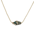 Detail shot of a golden beaded chain necklace with a green conch shell pendant - Dark Green