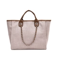 Bolso saco de lona beige con asas de cuero marrón y detalle de cadena de metal - Caqui