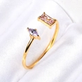 Detailed macro view of the gold-plated open ring with pink and lilac gemstones - US 6 / Pink and Purple