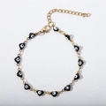 Bracciale in acciaio inossidabile placcato oro 18K con cuori neri e ciondoli evil eye - Nero
