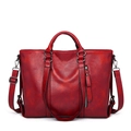 Red leather tote bag with handles and detachable shoulder strap on white background - Burgundy