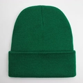 Macro detail of grass green knit beanie showing fine texture and ribbed stitching - One Size / Green