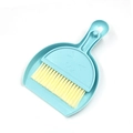 Mini handheld dustpan and brush set in light blue with cute cat face design for desk - Smiley Nordic Blue