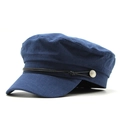 Dettaglio del berretto newsboy blu con trama tessuta, corda decorativa e bottone in metallo - M (56-58cm) / Blu navy