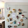 3D food-shaped fridge magnets set featuring bread, coffee and eggs on white refrigerator - 18-Piece Simulation Food Set