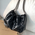 Elegant black bucket bag with 3D bows and leather chain strap in a soft PU finish - Black
