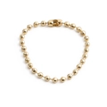 Pulsera minimalista de cuentas doradas con cierre de barril sobre fondo blanco - Pulsera de Cuentas Facetadas / Dorado