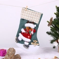 Dettaglio della calza di Natale con pupazzo di neve in 3D e cartello Merry Christmas - Renna che scia