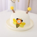 Cute beige straw hat for kids featuring a yellow cartoon bee design and plush pom-poms - Hat Only / Cream