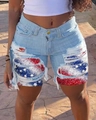 Detail view of frayed denim shorts with US flag patch inserts and distressed holes - S / Rhinestone Starry Sky Patch