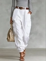 Detail view of white high-waisted cargo pants with pockets and a brown leather belt - White