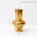Modern electroplated gold ceramic vase with a reflective mirror finish in small size - Small Gold Vase