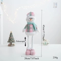 Detail of pink and green telescopic snowman doll showing 45cm height and measurements - Pink Snowman