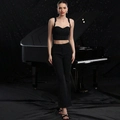 Detail of elegant black pinstripe two-piece set featuring crop camisole and flared trousers - S / Black