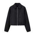 Close-up detail of silver zipper closure on a minimalist black cropped jacket with collar - XS / Black