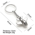 Polished silver zinc alloy airplane keychain showing dimensions and mirror finish - X-264 Small Aircraft