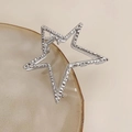 Pinza per capelli a stella argento Y2K con trama martellata su piatto di ceramica - Pinza a stella / Argento
