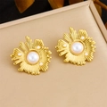 Golden sunburst earrings with central large pearl on a minimalist beige display pad - Sunflower Pearl Stud Earrings (E6211)