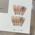 Handmade cat eye press-on nails with blue oval gemstone and rhinestone chains - Shark Tear (Nude Gradient Green Gem)