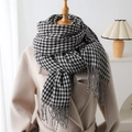 Classic black and white houndstooth cashmere scarf with tassels styled on a model - 210cmX70cm (Including Tassels) / Black