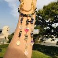Detail of moon suncatcher with blue natural stones and golden butterfly pendant - Lapis Lazuli