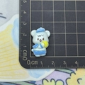 Close-up of small resin sailor bear figurine showing 2.5cm size scale on a ruler - Bear Sailor