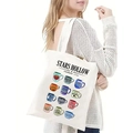 Detalle del bolso tote de lona blanca con ilustraciones de tazas de Stars Hollow - Estampado de tazas de Stars Hollow