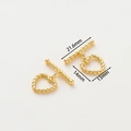 Macro detail of 14k gold-plated heart-shaped OT toggle clasp for DIY jewelry making - 18K Twist Heart OT Clasp - 4Pcs/Pack