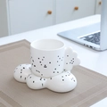 Chubby white ceramic coffee mug with black polka dots and cloud-shaped handle base - Cloud Cup & Saucer - Ink Splatter Black