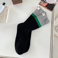 Skateboard crew socks in black, green, and grey color-block with NT logo label - One Size / Black