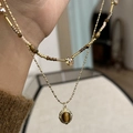 Dettaglio collana a due strati con ciondolo occhio di tigre e cristallo a goccia - Stile a Doppio Strato (Placcato Oro) / Oro/Marrone