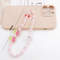 Pink and white beaded phone strap with pearls and bow charms in 160mm length - Flower Crackle Bead (K1194)