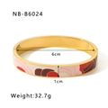 Detail showing 6cm inner diameter and 1cm width of the 18k gold plated enamel bangle - 18K/Width 1.0cm / Pink Red Geometric (NB-B6024)