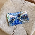 Elastic yoga headband featuring a blue fabric with floral and butterfly patterns - Blue Butterfly Headband