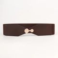 Detail of brown elastic waist belt with a round gold metal buckle on a white background - Coffee