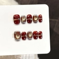 Handmade burgundy cat-eye press-on nails with shimmering gold glitter and silver stars - Extra Small (XS) / Ultra Short Trapezoid (3357)