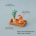 Miniature Christmas gingerbread man with red hat and blue flower in a wood tray - Gingerbread Man Set 2